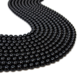 Strands of 6mm round Black Tourmaline.