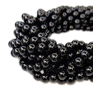 Strands of 6mm round Black Tourmaline.