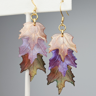 Closeup view of cascade leaf earrings.