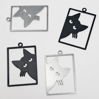 four stainless steel charms that look like cats peering out of a window frame