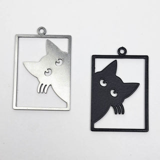 two stainless steel charms that look like cats peering out of a window frame
