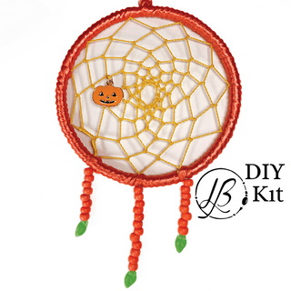 orange dreamcatcher on white background