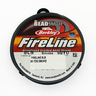 A 50yd spool of 8lb Smoke Fireline bead thread.