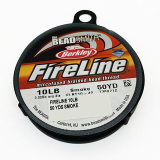A 50yd spool of 11lb Smoke Fireline bead thread.
