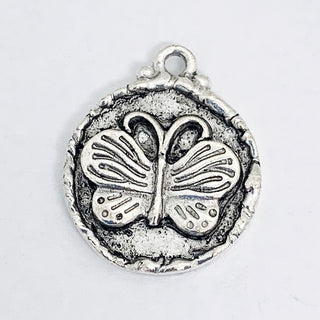 Antique silver plated round charm with embossed butterfly and rim.