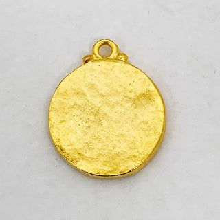 Back of round satin gold plated charm.