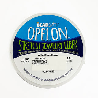 A spool of Opelon Stretch Jewelry Fiber, a stringing material for beads.