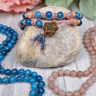 Pink moonstone macrame bracelet with strands.