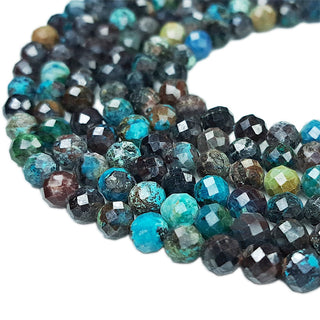 Strands of 5mm round faceted Chrysocolla beads.