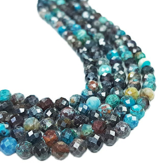 Strands of 5mm round faceted Chrysocolla beads.