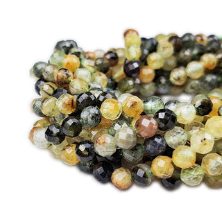 Strands of 5mm round faceted Prehnite beads.