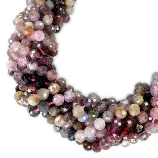 Strands of 5mm round faceted Spinel beads.