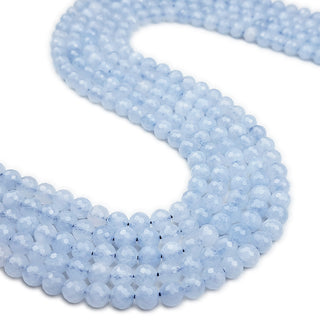 Strands of mm round faceted Aquamarine beads (light).