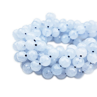 Strands of mm round faceted Aquamarine beads (light).