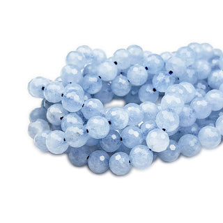 Strands of 6mm round faceted Aquamarine beads (dark).