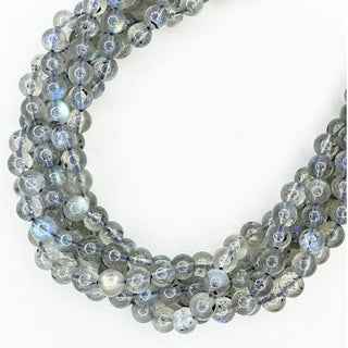 Strands of 6mm round Labradorite beads.