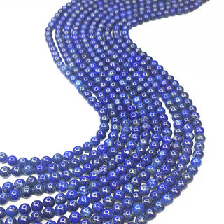 Strands of 6mm round lapis beads.