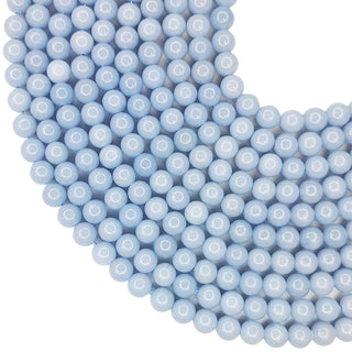 Strands of 7mm round Angelite beads.