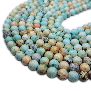 Strands of 8mm round Peruvian Turquoise beads.