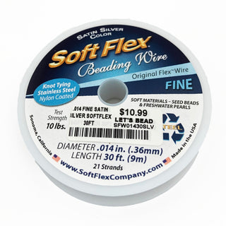 A spool of Soft Flex Beading WIre in Satin Silver, used as a  stringing material for beads.