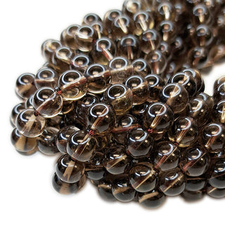 Strands of 9mm round Smoky Quartz.