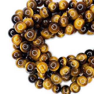 Strands of 10mm round Tiger Eye beads.