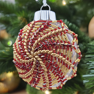 DIY Let's Bead Super Spirals beaded ornament kit in gold and red spirals.