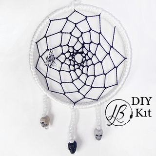 white and black dreamcatcher on white background