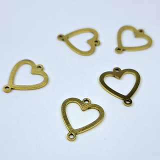 5 gold heart charms on white