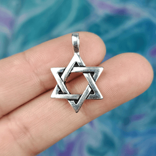 star of david charm on fingers